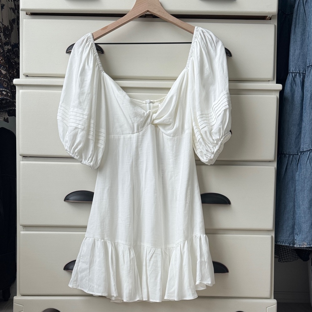 Saints Secrets twist front flounce dress